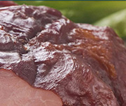 Zoomed In A piece of meat with the skin on it Ham 