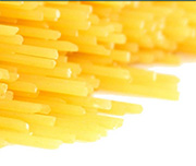Zoomed In A white background with pointy-yellow objects on the right Spaghetti