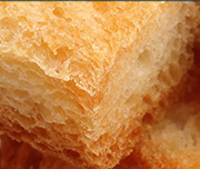 Zoomed In A piece of bread that is crispy and hard Crouton 