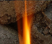 Zoomed In Piece of grey rocks on fire Charcoal 
