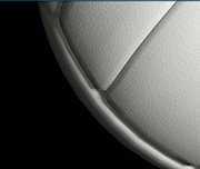 Zoomed In A black background with a round white ball Volleyball 