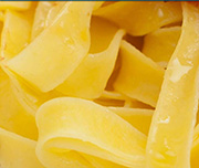 Zoomed In Flat, thick pasta Fettuccine 