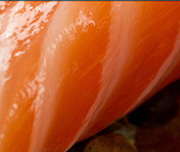 Zoomed In An orange piece of food Salmon 