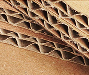 Zoomed In A bunch of boards piled together Cardboard 