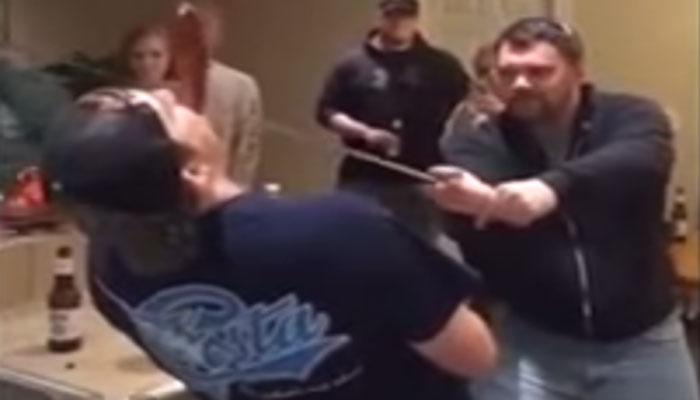man chops friend nose off with sword